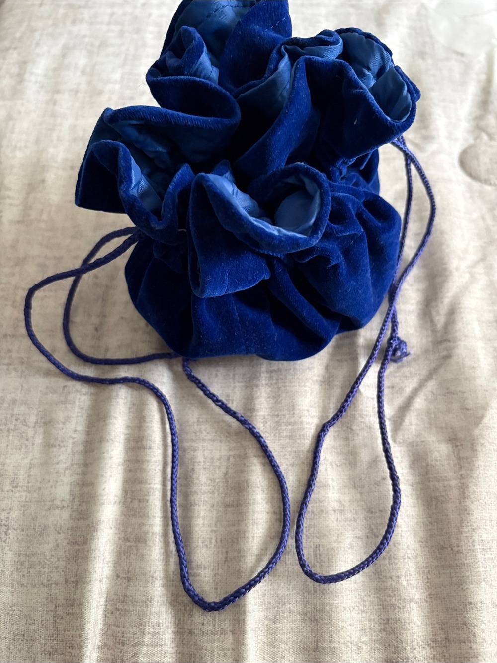 Velvet Drawstring Pouch Bag in Deep Blue. Excellent for travel. Pockets all arou